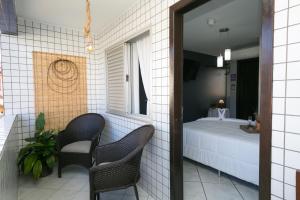 Postel nebo postele na pokoji v ubytování Hotel Pousada Porto da Lua
