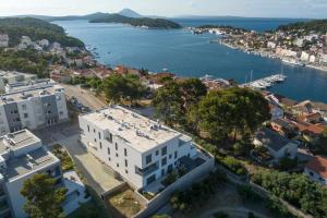 an aerial view of a city and a body of water at Apartments Tony in Mali Lošinj