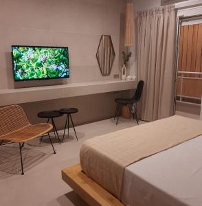 TV a/nebo společenská místnost v ubytování Sroom Apartment