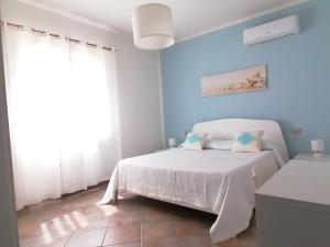 Ένα ή περισσότερα κρεβάτια σε δωμάτιο στο Marea Apartment