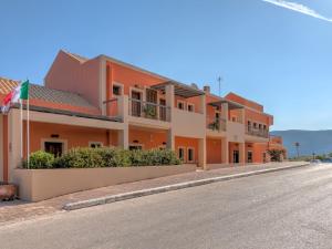 an empty street in front of a building at Fiscardo Bay Hotel in Fiskardo