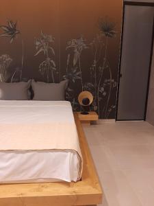 Postel nebo postele na pokoji v ubytování Sroom Apartment