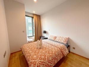 Ένα ή περισσότερα κρεβάτια σε δωμάτιο στο 1BR Luxury Condo 50m to Thonglor BTS station +21 φωτογραφίες