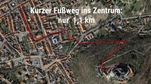 a map of a city with a red line at Designpension Traumschloss Hotel Garni in Wernigerode