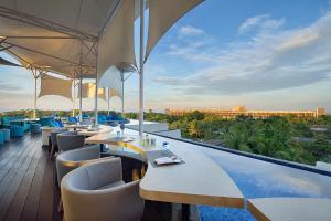 Balkón nebo terasa v ubytování de Vins Sky Hotel Seminyak