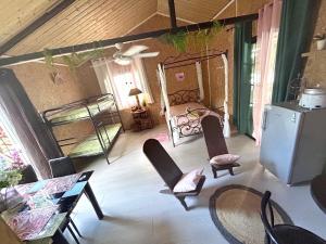 Posezení v ubytování Chalet pittoresque à Le Tampon, vue mont.