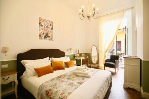 Postel nebo postele na pokoji v ubytování Macchiato Suites Boutique Guest House