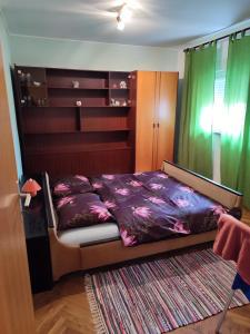 Posteľ alebo postele v izbe v ubytovaní sanya