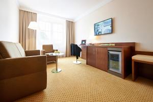 TV a/nebo společenská místnost v ubytování Hotel Admiral am Kurpark