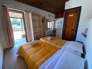 Villaggio La Roccia camping客房内的一张或多张床位