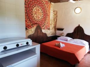Villaggio La Roccia camping客房内的一张或多张床位