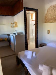 Villaggio La Roccia camping客房内的一张或多张床位
