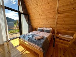 Postel nebo postele na pokoji v ubytování Cozy Cottages