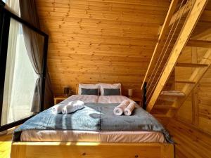 Postel nebo postele na pokoji v ubytování Cozy Cottages