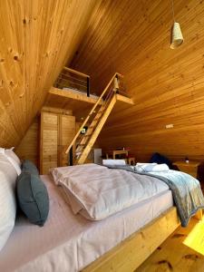Postel nebo postele na pokoji v ubytování Cozy Cottages