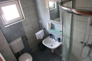 Koupelna v ubytování Villa Paladina