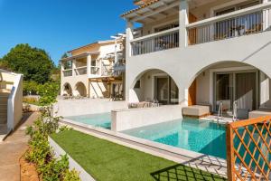 an image of a house with a swimming pool at Eterrano Seaside Retreat in Parga