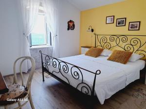 Heritage Rooms Kut客房内的一张或多张床位
