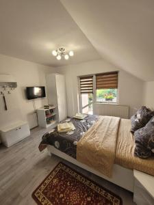 Ένα ή περισσότερα κρεβάτια σε δωμάτιο στο Vila Castelana +46 φωτογραφίες