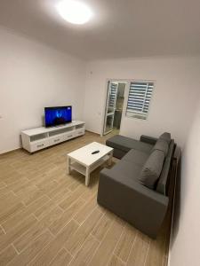 A seating area at Militari Comfort Apartment