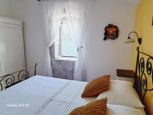 Heritage Rooms Kut客房内的一张或多张床位