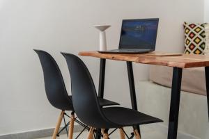 TV a/nebo společenská místnost v ubytování Diamantis Studios&Apartments