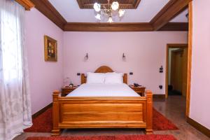 Postel nebo postele na pokoji v ubytování Brilant Antik Hotel