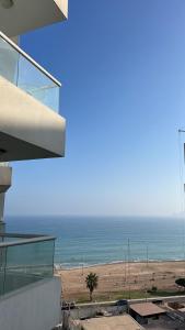 a view of the ocean from a building at CONDOMINIO PANORAMIC in Lima