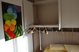 A bed or beds in a room at Il Terrazzo 40 metri dal mare