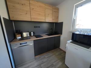 A kitchen or kitchenette at Apartmán Andrea