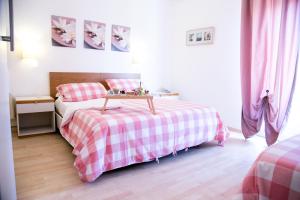 Postel nebo postele na pokoji v ubytování Hotel Kinda