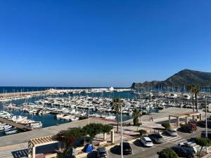 a bunch of boats parked in a marina at Piso en Puerto de Altea in Altea