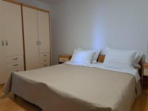Postel nebo postele na pokoji v ubytování Apartments Granić