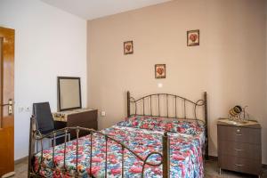 Postel nebo postele na pokoji v ubytování Mythos House