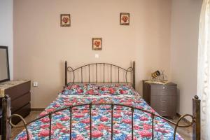 Postel nebo postele na pokoji v ubytování Mythos House