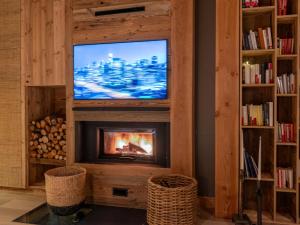 TV/Unterhaltungsangebot in der Unterkunft Superbe ferme rénovée en chalet de luxe en PLEINE NATURE