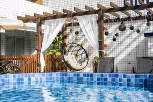 Bazén v ubytování Hotel Pousada Porto da Lua nebo v jeho okolí