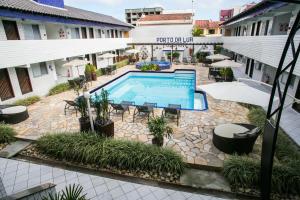 Bazén v ubytování Hotel Pousada Porto da Lua nebo v jeho okolí