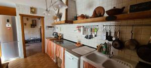 a kitchen with a sink and a counter top at Casa Vargas in Pedrezuela