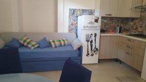 Η κουζίνα ή μικρή κουζίνα στο Happy Home - parcheggio gratuito in box