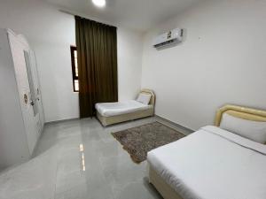 Katil atau katil-katil dalam bilik di Red-3 - New Salalah