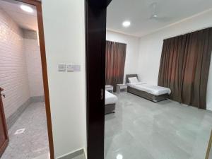 Katil atau katil-katil dalam bilik di Red-3 - New Salalah
