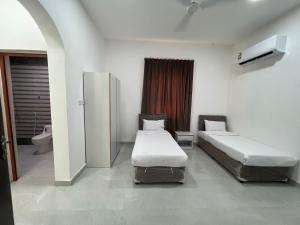 Katil atau katil-katil dalam bilik di Red-3 - New Salalah