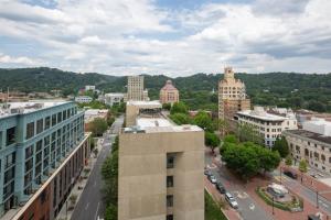 an aerial view of a city with buildings at 'Cloud 10' A Luxury Downtown Condo with Panoramic City and Mountain Views at Arras Vacation Rentals in Asheville