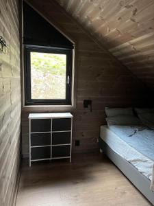 Postel nebo postele na pokoji v ubytování Rindabotten Panorama