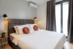 Postel nebo postele na pokoji v ubytování Apartments Jadranka