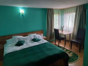 Postel nebo postele na pokoji v ubytování Montana Touring