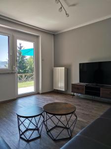A television and/or entertainment centre at See:Zeit Das_Ferienhaus