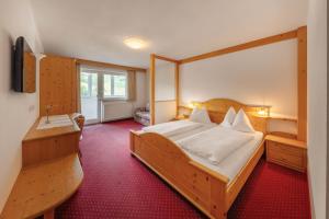 Postel nebo postele na pokoji v ubytování B&B 2000 - Panorama Pension