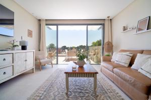 Posezení v ubytování Cabopino Boutique Apartment